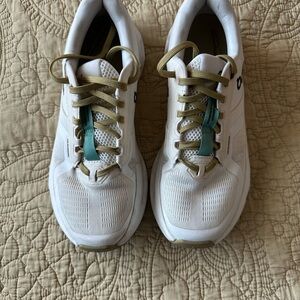 On Running White and Green Athletic Shoes Lightweight Performance